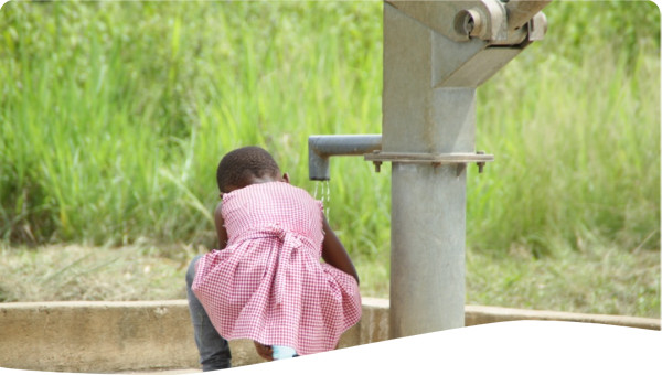 School child at a borehole